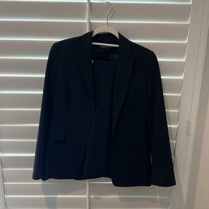 Elie Tahari black suit, including coat and pants.